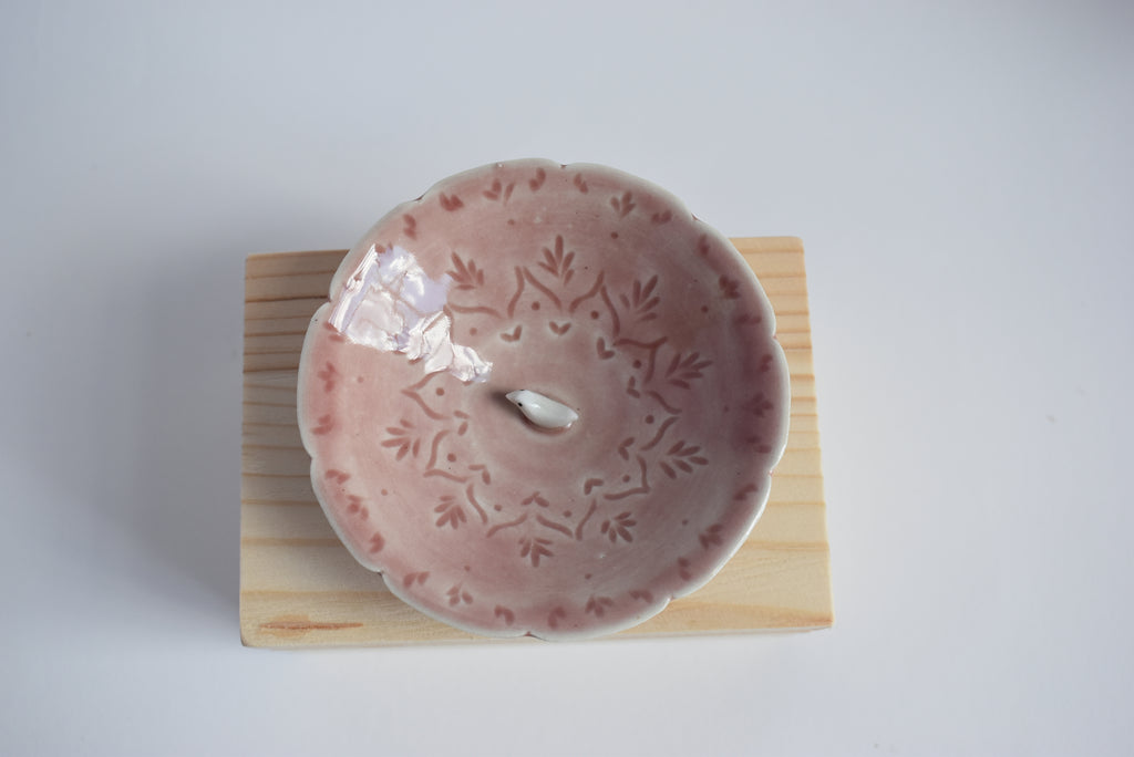 Bird in a trinket dish