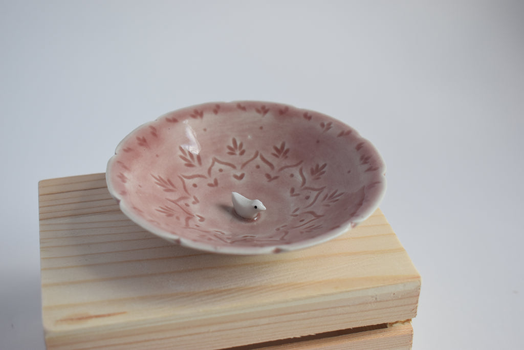 Bird in a trinket dish