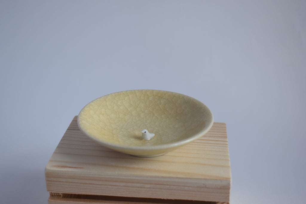Bird in a trinket dish